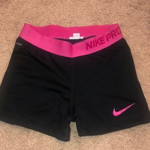 Classic black and pink nike pros